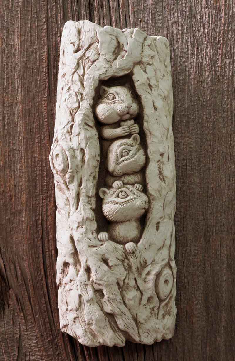 Three Little Chipmunks plaque hanging on a weathered wooden wall